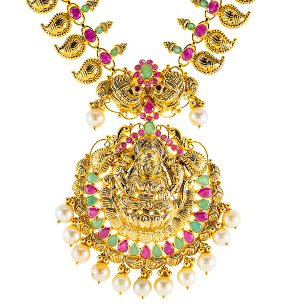 22K Antique Yellow Gold Temple Necklace w/ Emerald, Pearls & Ruby (73.4gm) | Inspired by traditional Indian Temple jewelry, this 22k gold necklace set from Virani Jewelers sh...