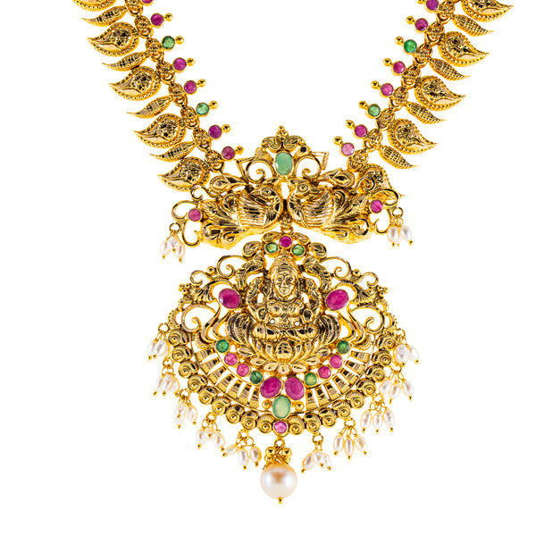 22K Antique Yellow Gold Temple Necklace w/ Emerald, Pearl & Ruby (54.3gm) | 



Drawing inspiration from the beauty of Indian temple jewelry, this 22k gold necklace with eme...