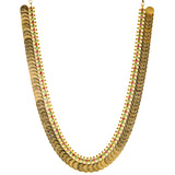 22K Yellow Gold Kasu Necklace w/ Emerald & Ruby (71.2gm) | 




This 22k yellow gold Kasu necklace from Virani Jewelers captures the essence of our traditio...