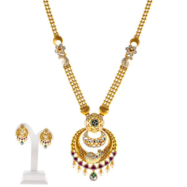 22K Yellow Gold Necklace Set w/ Kundan, Emerald, CZ, Pearls, and Ruby (85.2gm) | 



This 22k yellow gold necklace and earring set by Virani Jewelers showcases the exquisite arti...