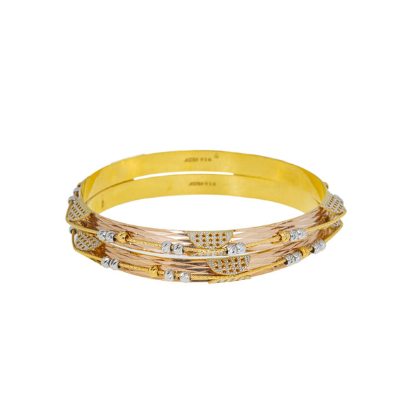 22K Multi-Tone Gold Bangle Set of 2 (42.2gm) | 



This luxurious 22k gold bangle set by Virani Jewelers brings together the warm glow of yellow...