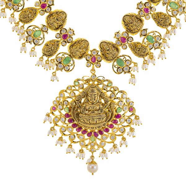 22K Yellow Gold Temple Necklace w/ Emerald, Ruby, Pearl & CZ (87.2gm) | 



Virani Jewelers’ 22k gold temple necklace embodies the beauty of Indian gold jewelry with its...