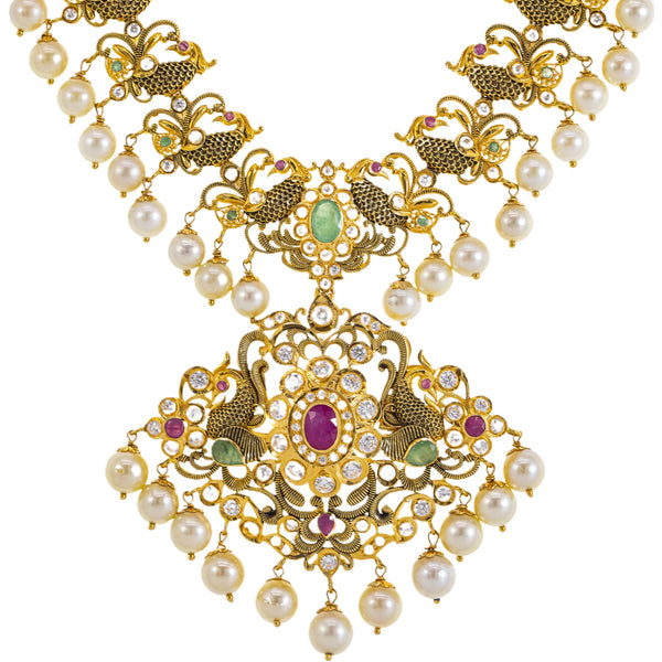 22K Yellow Gold Temple Necklace w/ Emerald, Ruby, Pearl & CZ (80.5gm) | 



This 22k gold necklace set by Virani Jewelers combines traditional temple jewelry artistry wi...