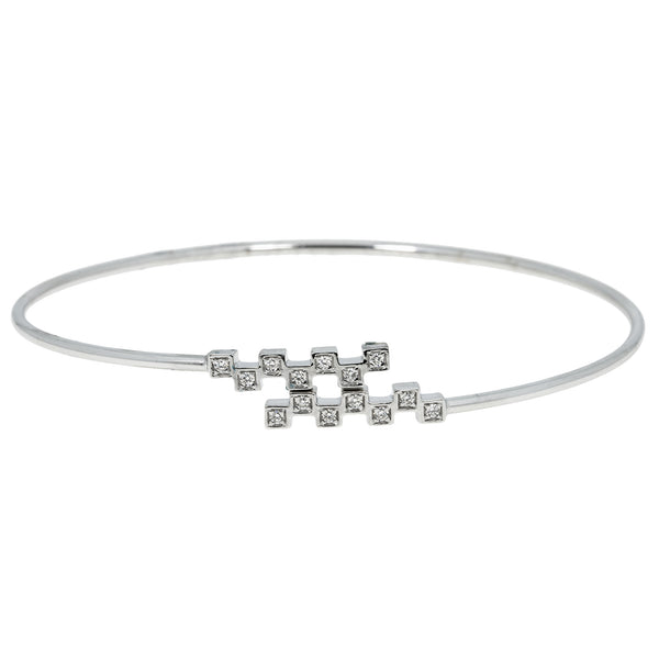 18K White Gold & 0.12 ct Diamond Bangle (3.9 grams) | 




Indulge in the luxury of this 18k white gold and diamond bangle from Virani Jewelers.This el...