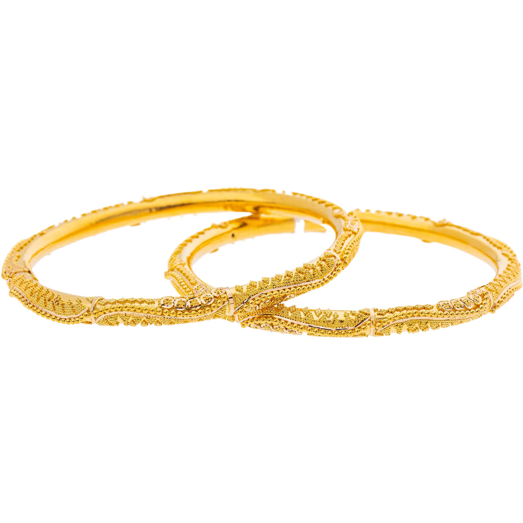 22K Yellow Gold Bangle Set of 2 (40.1gm) | 



Enhance your ensemble with this intricately designed 22k gold bangle set, inspired by the gra...