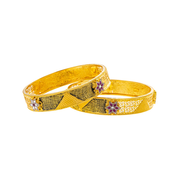 22K Yellow Gold, Ruby & CZ Bangle Set of 2 in Size 2.6 (43.8gm) | 



Elevate your elegance with Viranis Jewelers' set of 22k yellow gold bangles, adorned with rub...