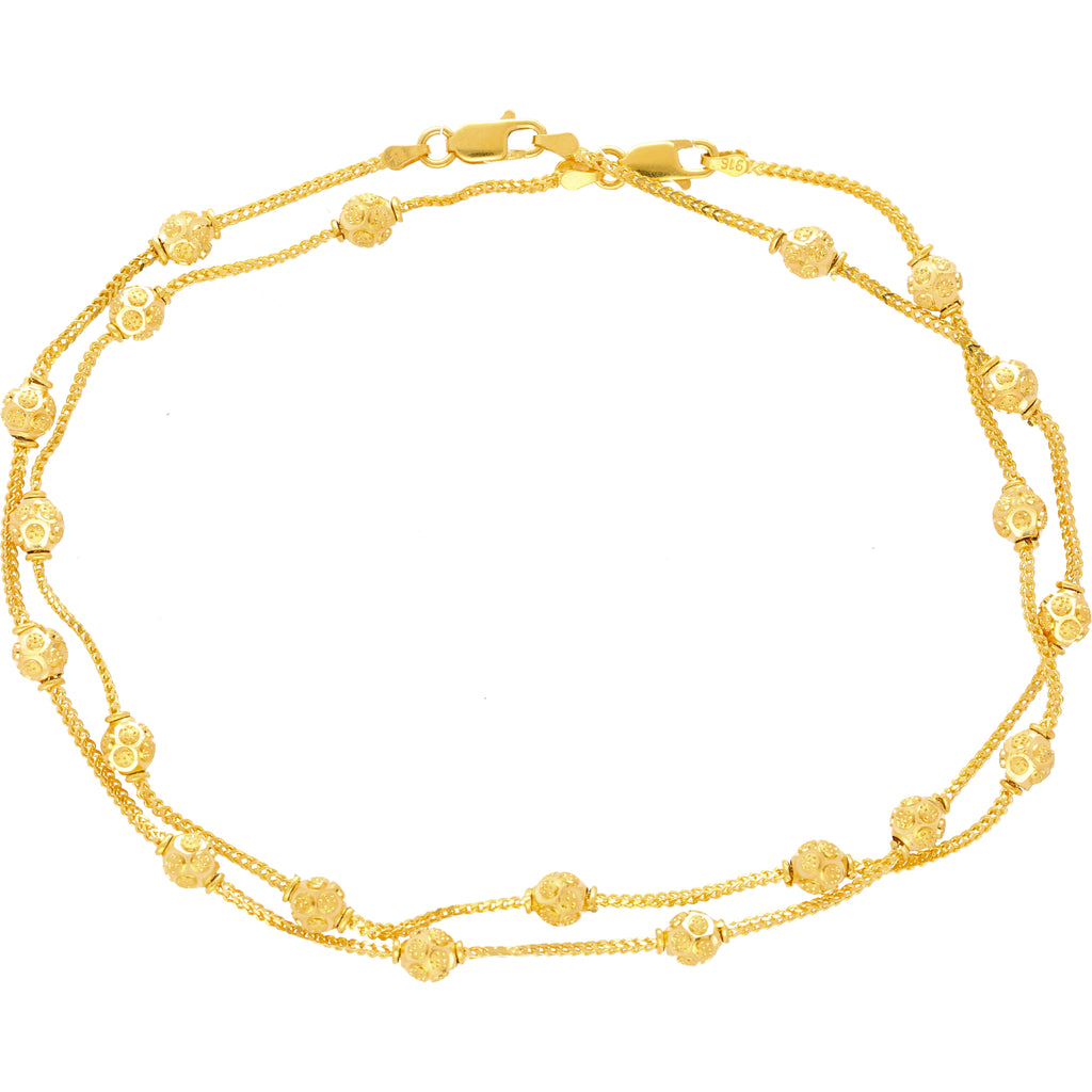 22K Yellow Gold Ball Bead Anklet Set (16.4gm) | 
This simple 22k yellow gold anklet set has sophisticated beading with an engraved design.Feature...