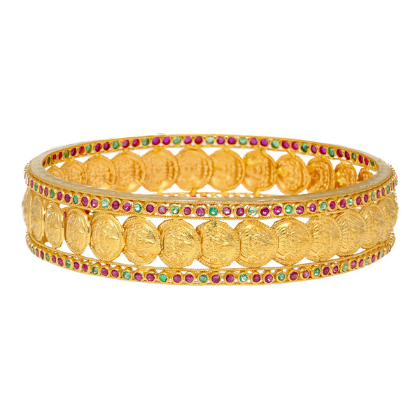 22K Yellow Gold Kasu Laxmi Bangle Set (43.4 grams) | 
These colorful bangles have a beautiful arrangement of emeralds and rubies delicately placed aga...