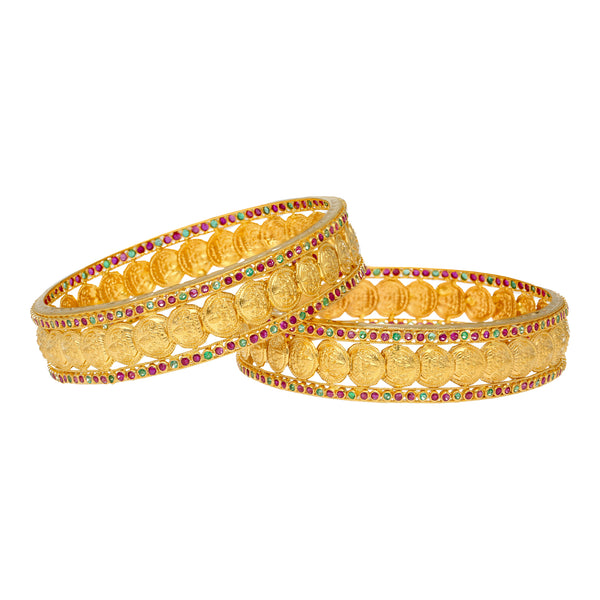 22K Yellow Gold Kasu Laxmi Bangle Set (43.4 grams) | 
These colorful bangles have a beautiful arrangement of emeralds and rubies delicately placed aga...