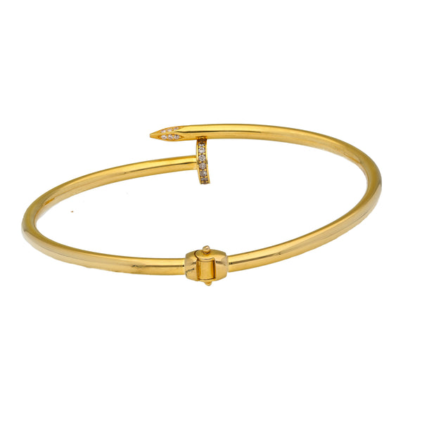 18K Yellow Gold & CZ Nail Bangle (10.5gm) | 


This one of a kind 22k yellow gold bangle features shimmering cubic zirconia and a unique desi...